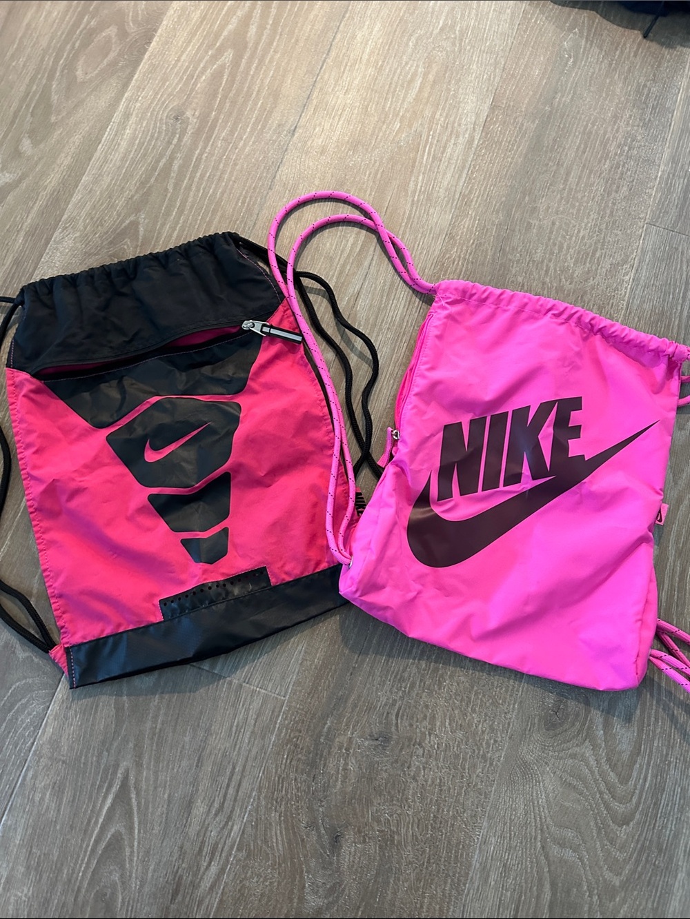 2 pink nike drawstring backpacks